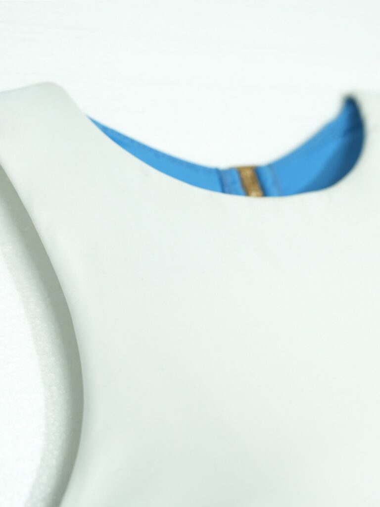 Close-up of the elastic binding inside the neckline of the Pona one-piece