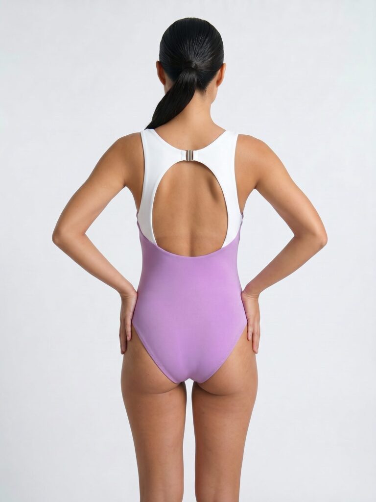 Studio back view of the Pona high-neck one-piece in wildrose pink