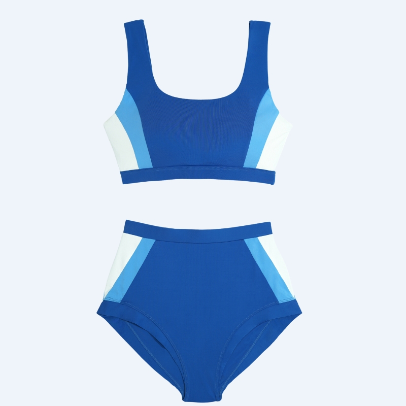 Flat lay of the Zeta color-block two-piece swimsuit in royal blue