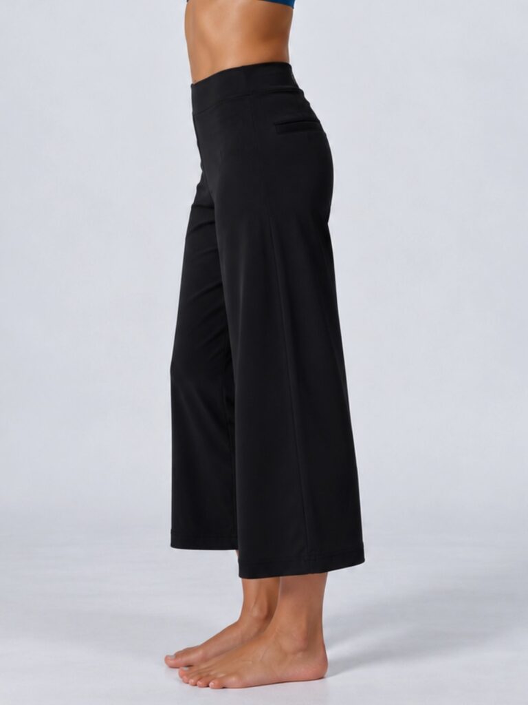 Studio side view of the black wide-leg cropped pants showing the high waist and cropped length