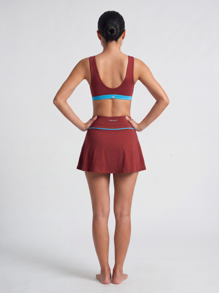 Back view of the Siena top and skort showing the scoop back and wide waistband